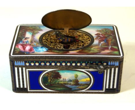 A fine quality hallmarked silver gilt and pictorial enamel singing bird box
By Karl Griesbaum, the cover and two panels paint