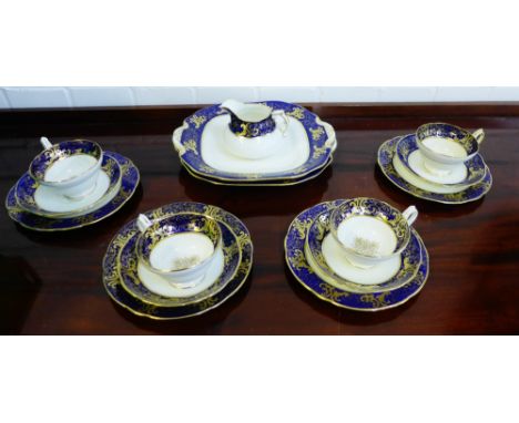 A Hammersley & Co blue and white porcelain teaset with gilt edged rim