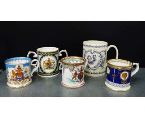 A collection of porcelain Royal Commemorative tankards and loving cups to include Royal Worcester, together with a Wedgwood e