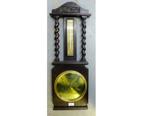 An oak cased wall barometer with brass dial and thermometer plaque, 75cm long