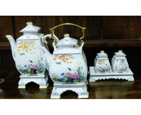 Franklin Mint Japanese porcelain tea wares to include two tea kettles on stand, two small pots, three rectangular stands, a s