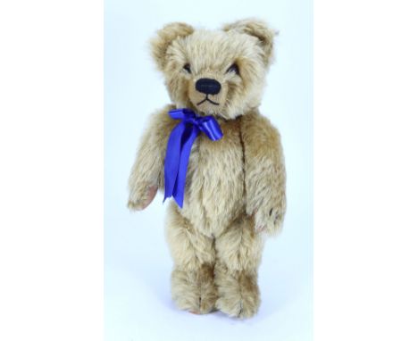 A good Chad Valley golden mohair Teddy bear, circa 1930, kapok filled shaggy mohair bear with glass eyes, shaved muzzle, stit