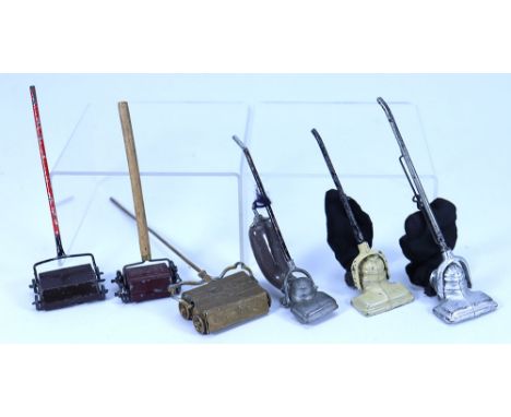 Six Dolls House carpet sweeps and Hoovers, including gold painted carpet sweep, German Joeal sweep, two Taylor & Barret lead 