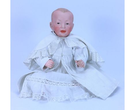 A Kammer & Reinhardt 100 bisque head character baby doll, German circa 1910, also known as ‘Kaiser Baby’, with painted brown 
