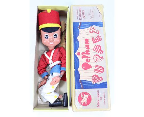 Pelham Puppet Enid Blyton’s Bom The Drummer Boy, circa 1960, wearing felt hat and uniform, boxed with Bom stamp, (condition: 