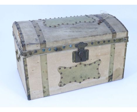 A late 19th century wooden linen and leather cover Dolls trunk, with brass studs, carry handles and original key, interior wi