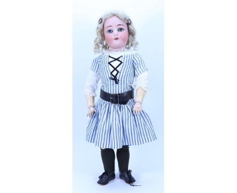 A Kammer & Reinhardt/S&H all original doll in box, German 1910, with weighted blue glass eyes, real lashes and painted brows,