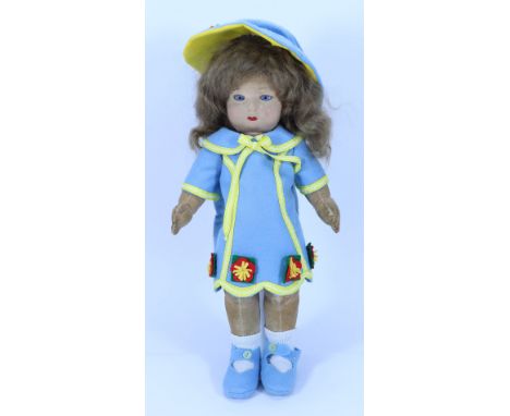 A  Chad Valley Bambina cloth doll, 1930s, with felt head, blue glass eyes, painted mouth and brown hair, swivel head to velve