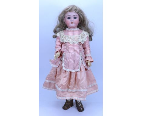 A large Handwerck DEP bisque head doll, German circa 1915, with weighted blue  glass eyes, painted brows and open mouth with 