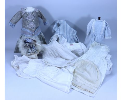 Collection of Dolls clothing, including light blue silk dress with patterned bodice, pleated skirt, ribbon sash and cream emb
