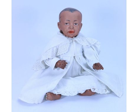 A Kammer & Reinhardt 100 brown bisque head character baby doll, German circa 1910, also known as ‘Kaiser Baby’, with painted 