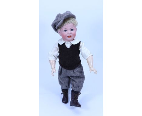 A Kammer & Reinhardt 116A bisque head character doll, German circa 1910, with weighted blue glass eyes, feather brows and ope