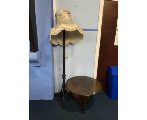 A mahogany standard lamp and an oak table