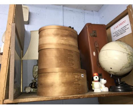 A shelf of assorted to include a trunk and an onyx table lamp etc.