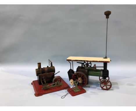 A Mamod traction engine, stationary engine and wheel 