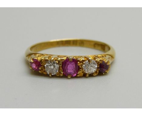 An 18ct gold, ruby and diamond ring, 2.5g, K, (one stone possibly replaced) 