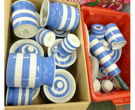 A box of TG Green storage jars and a box of TG Green kitchenalia including rolling pin and flour/sugar/salt shakers 