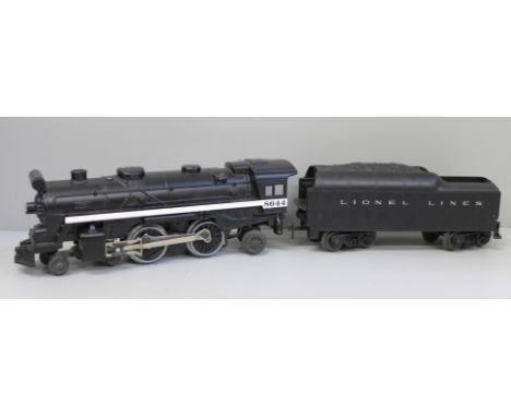A Lionel O gauge locomotive and tender 