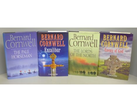 Four first edition novels by Bernard Cornwell, two signed 