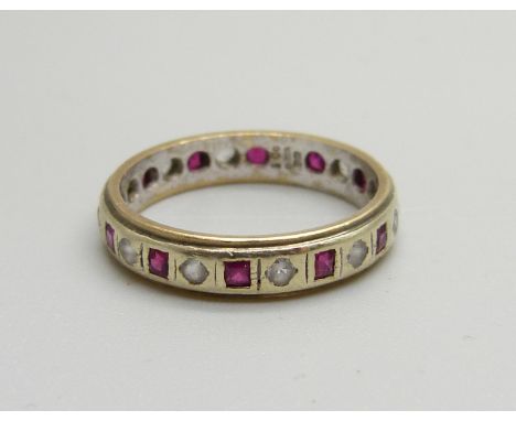 A 9ct gold, ruby and white stone full eternity ring, Birmingham 1963, 3g, Q 