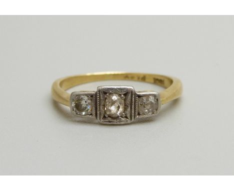 An Art Deco 18ct gold and three diamond ring, 2g, K 