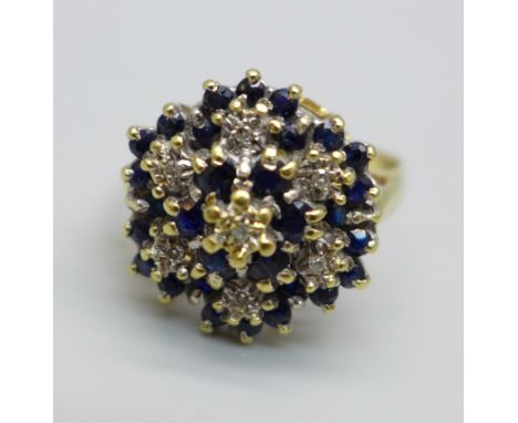 An 18ct gold, sapphire and diamond dress ring, 5.9g, T 