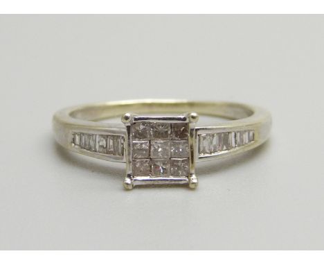 A 9ct white gold Princess cut twenty-three stone diamond ring, 2g, L 