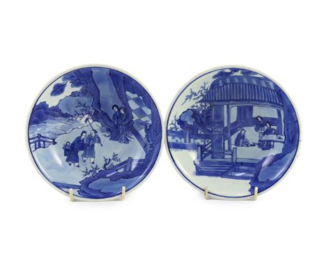 A pair of Chinese blue and white small dishes, Kangxi six character marks and of the period (1662-1722), each finely painted 