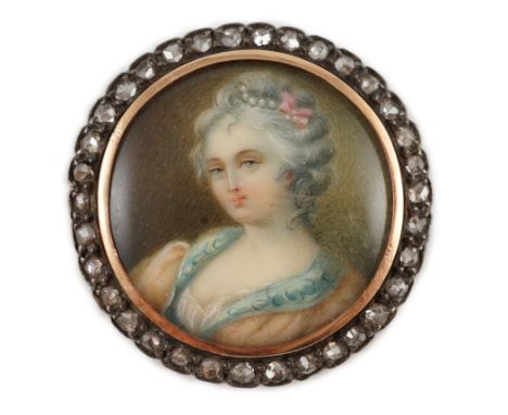 An Edwardian diamond set circular gold brooch with inset miniature portrait bust of a lady, 29mm gross weight 7.9 grams. Ivor