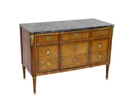 A Louis XVI ormolu mounted kingwood commode, with later variegated grey marble top over three short and two long drawers, on 