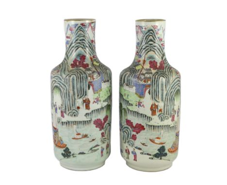 A pair of Chinese famille rose fencai inscribed vases, mid 19th century, each well painted with scholars and attendants in a 