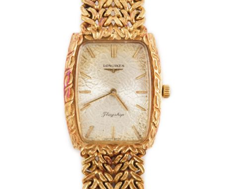 A gentleman's 1980's 18ct gold Longines Flagship manual wind tonneau shaped dress wrist watch, with 'samoradok' style dial an