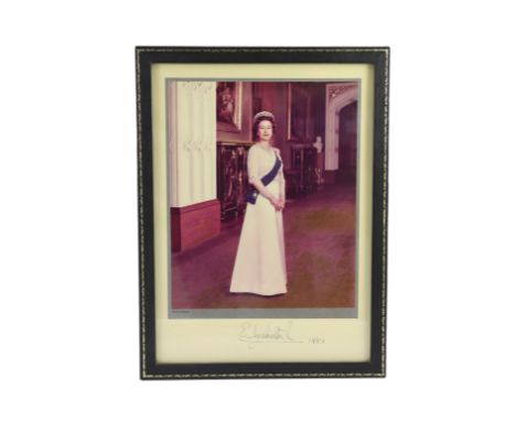 A signed colour photograph of Her Majesty Queen Elizabeth II, the Official Portrait taken by Peter Grugeon for the 1977 Silve