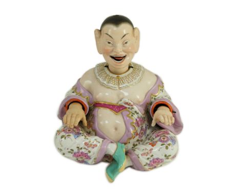 A Meissen figure of a nodding chinaman, 19th century, with weighted nodding head, moving tongue and hands, blue crossed sword