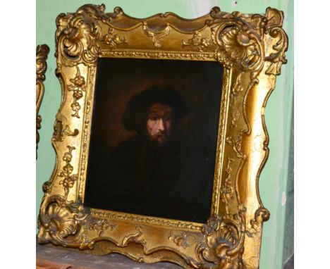 After Rembrandt van Rijn, Portrait of a bearded man in a cap, oil on board, 24cm by 21cm 