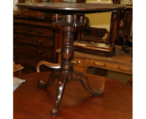 A George III tilt top tripod table 