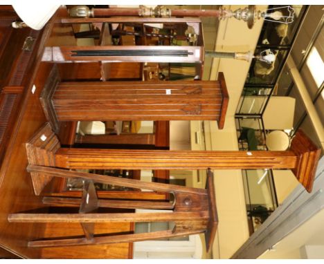 Four various jardiniere/plant stands together with a metal floor lamp