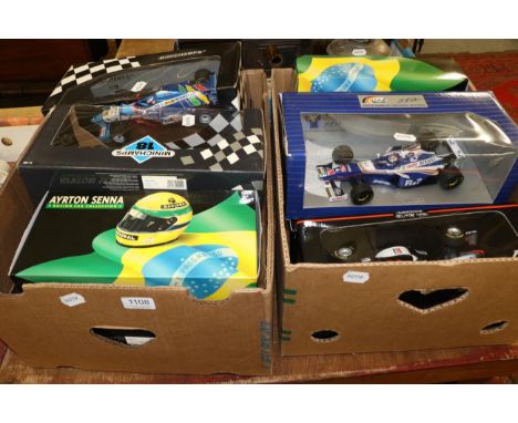 Eleven 1:18 scale models of Formula 1 racing cars including two Ayrton Senna examples