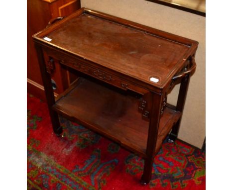 A Chinese hardwood trolley 70cm high, 65cm wide, 37cm deep. Ring marks, scuffs and scratches to the top. Some scratches to th