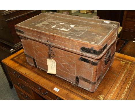 A leather travelling trunk, the cover named ''Capt W Philp''