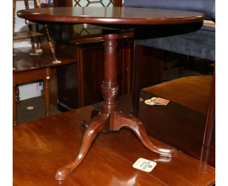 A George III tilt top tripod table 