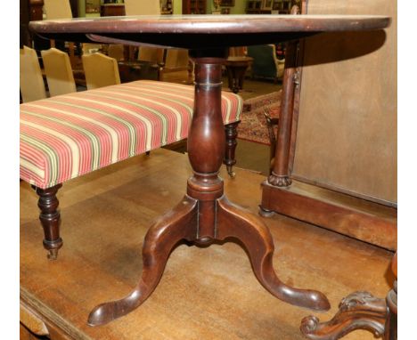 A mahogany tripod table 