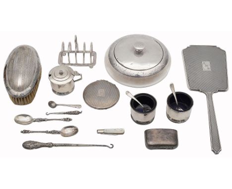 A collection of mostly early 20th century silver various dates and makersto include a silver mounted glass powder pot, an eng