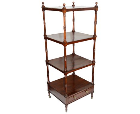 A Regency mahogany four tier whatnot, c.1820with ring turned supports with ball finials, the bottom tier containing a single 