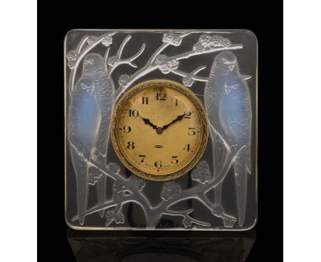 An R. Lalique 'Inseparables' opalescent clock featuring two pair of parakeets or 'love birds' on blossoming branches, the 8-d
