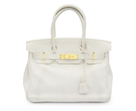 An Hermes Birkin 30 white Veau Swift leather bag2009with gold tooled toneware, the interior with single large pocket and zip,