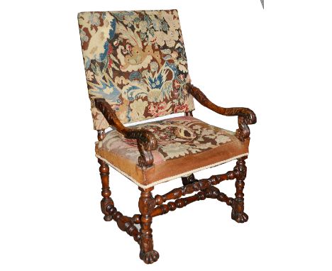 A late 17th century Flemish walnut and tapestry open armchair rectangular back and seat covered in needlework tapestry, swept