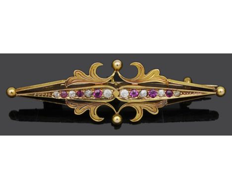 A 15ct gold ruby and diamond bar broochthe centre set with graduated rubies and diamonds, with chased scroll mount and safety