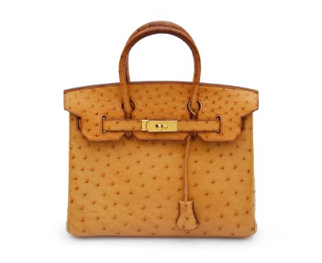 An Hermes swift golden brown/camel ostrich Birkin 30 bag2007with gilt toned toolware, clochette, interior zip pocket and larg