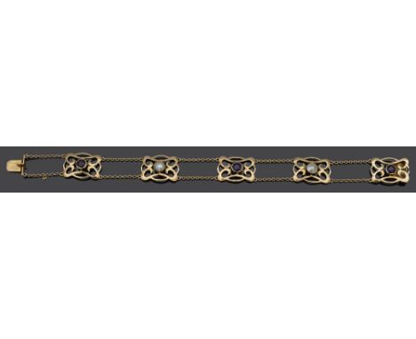 An Art Nouveau amethyst and blister pearl scroll panel braceletthe pierced panels set alternately with pearls and amethysts, 